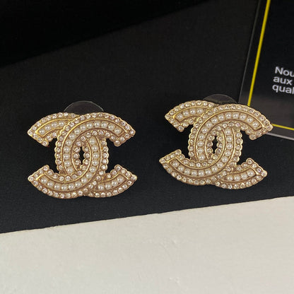 Boucles d'oreilles clous lettre perle diamant