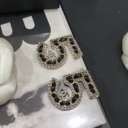 Boucles d'oreilles en cuir 5 strass