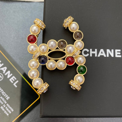 Broche de Perlas y Diamantes de Colores