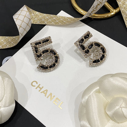 Boucles d'oreilles en cuir 5 strass