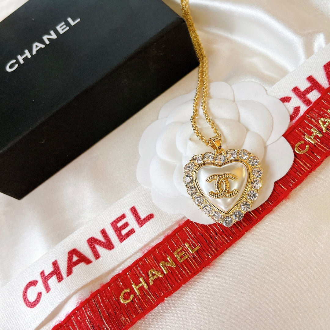 Conjunto de pendientes y collar de corazón con perlas y diamantes vintage