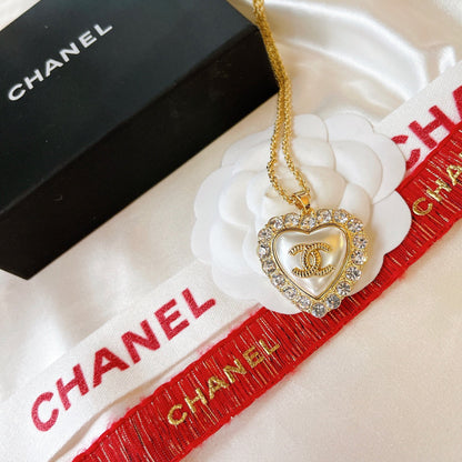 Conjunto de pendientes y collar de corazón con perlas y diamantes vintage