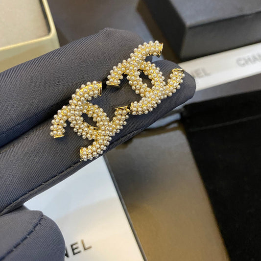 Boucles d'oreilles clous Tempérament Perle Logo