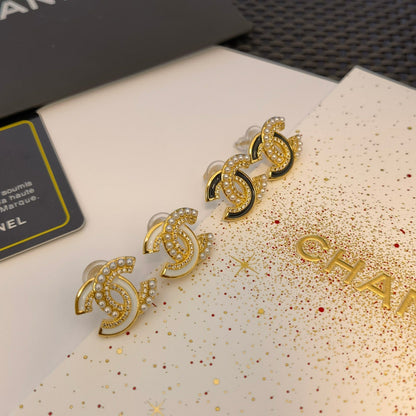 Pendientes de costura de perlas y diamantes de imitación de moda