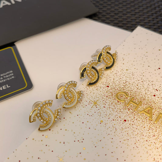 Pendientes de costura de perlas y diamantes de imitación de moda