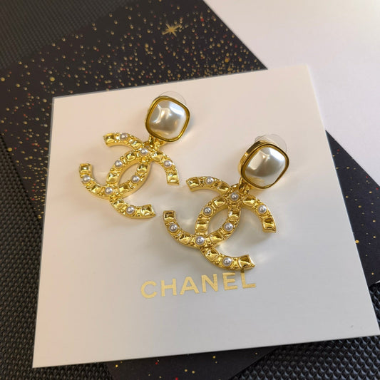 Boucles d'oreilles de luxe plaquées or avec perles
