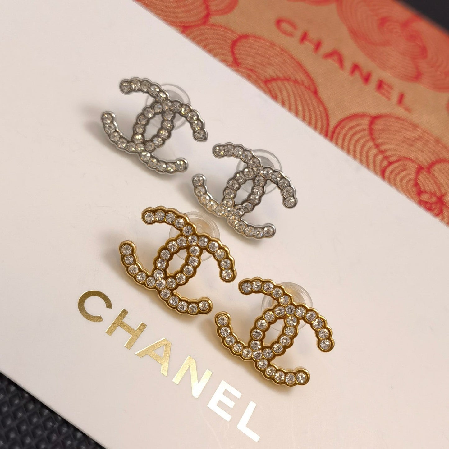 Pendientes con logo de diamante de 2 colores