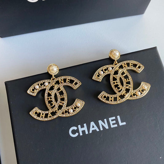 Boucles d'oreilles élégantes alphabet découpé