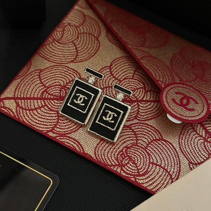 Pendientes de frasco de perfume negro
