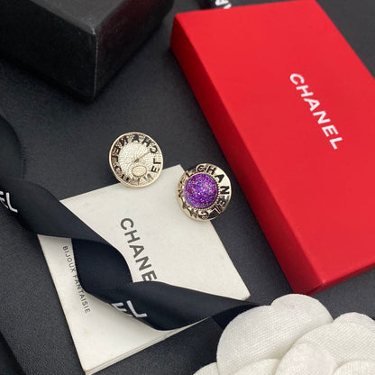 Boucles d'oreilles clous Balle violette lettre creuse