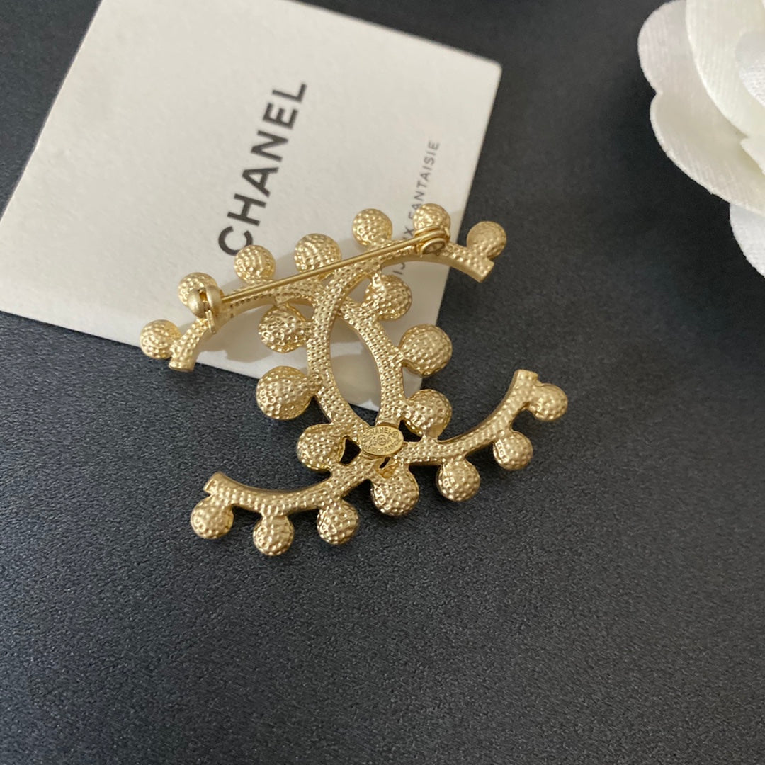 Broche de moda clásico