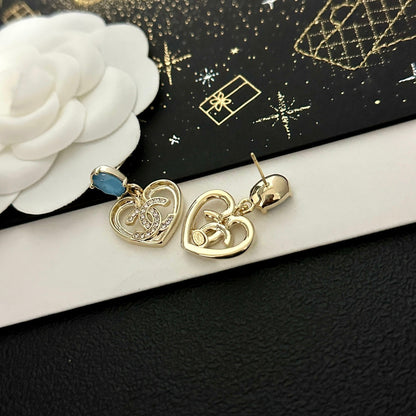Boucles d'oreilles cœur vintage en pierre précieuse bleue