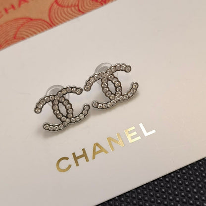 Pendientes con logo de diamante de 2 colores