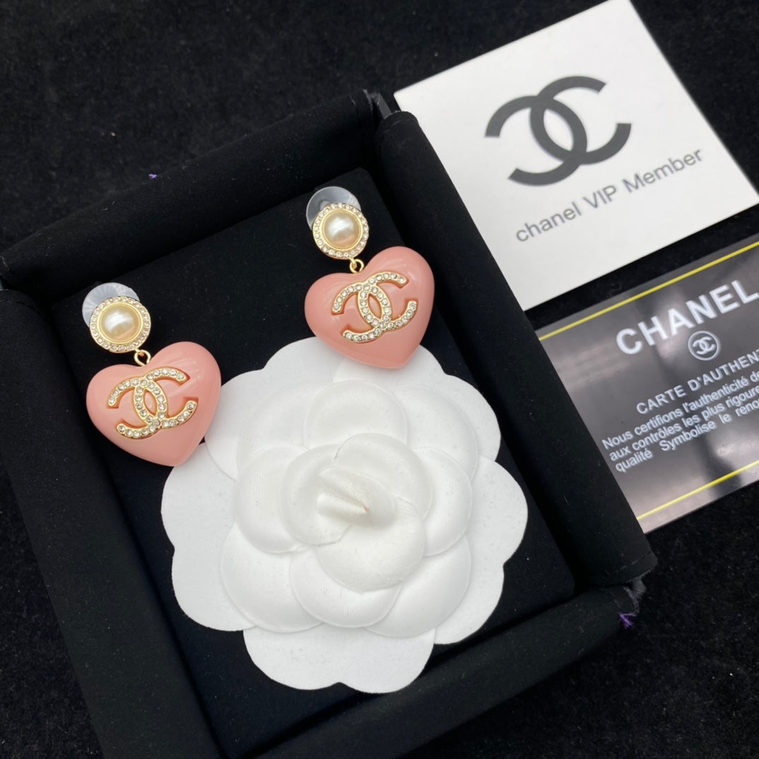 Elegantes pendientes de corazón rosa