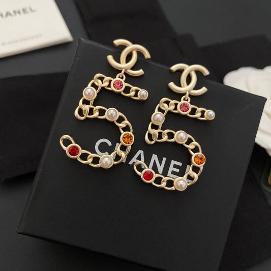 Nouvelles boucles d'oreilles n°5 en diamant de couleur