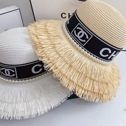 Chapeau de paille à franges et perles