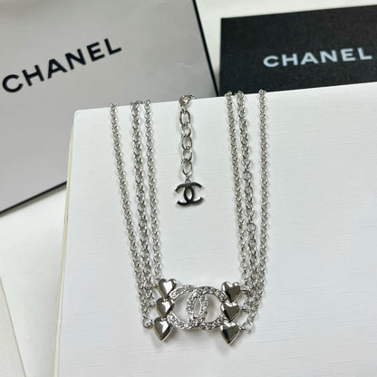 Conjunto de collar y pendientes de clip de diamantes de imitación de corazón de moda