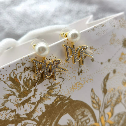 Boucles d'oreilles élégantes en perles et strass lettres