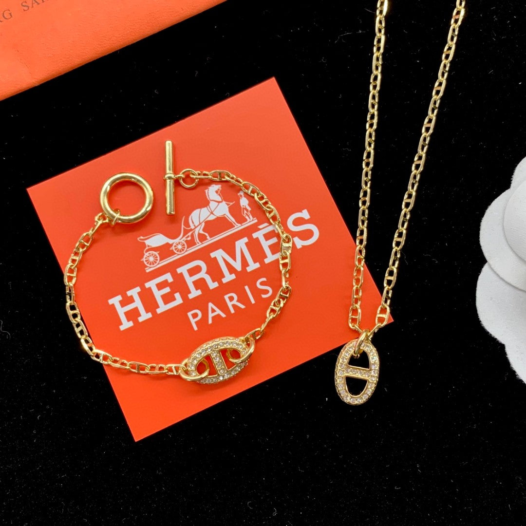 Juego de joyas de oro con logotipo de farándula clásico