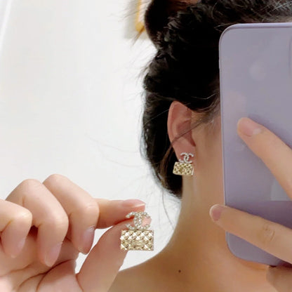 Boucles d'oreilles pendentifs sac mode
