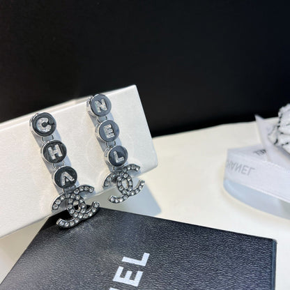 Boucles d'oreilles tendance avec pendentif lettre
