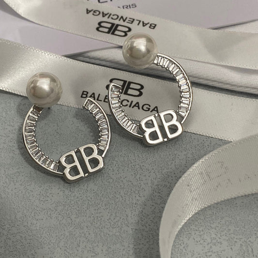 Boucles d'oreilles créoles perles et diamants