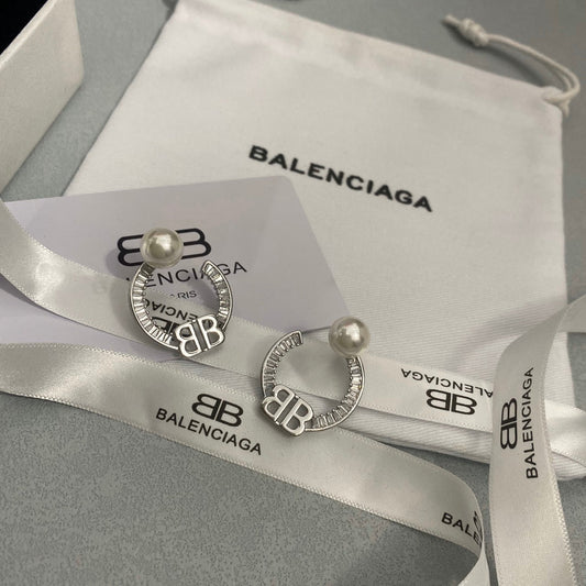 Boucles d'oreilles créoles perles et diamants