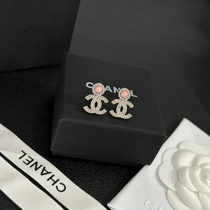 Pendientes de diamantes con gema de temperamento