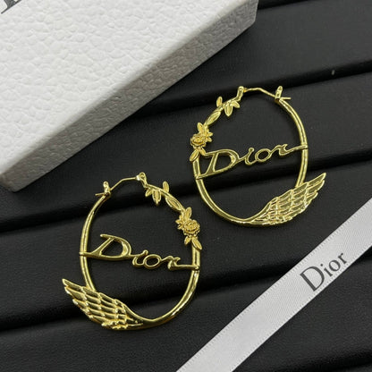 Boucles d'oreilles lettre, fleur et ailes