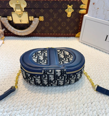 Bolso de cámara ovalado