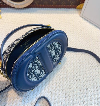 Bolso de cámara ovalado
