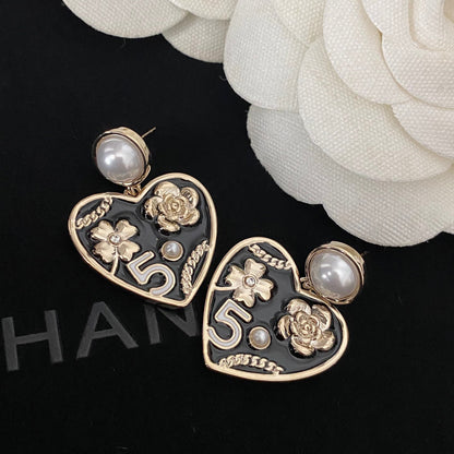 Boucles d'oreilles cœur fleur perle élégantes