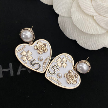 Boucles d'oreilles cœur fleur perle élégantes