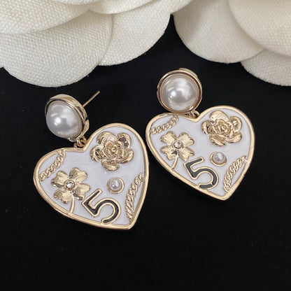 Boucles d'oreilles cœur fleur perle élégantes