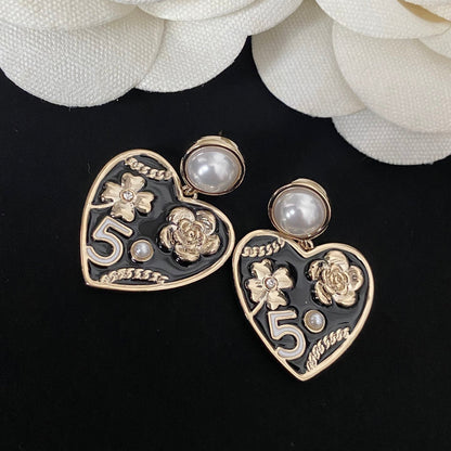 Boucles d'oreilles cœur fleur perle élégantes