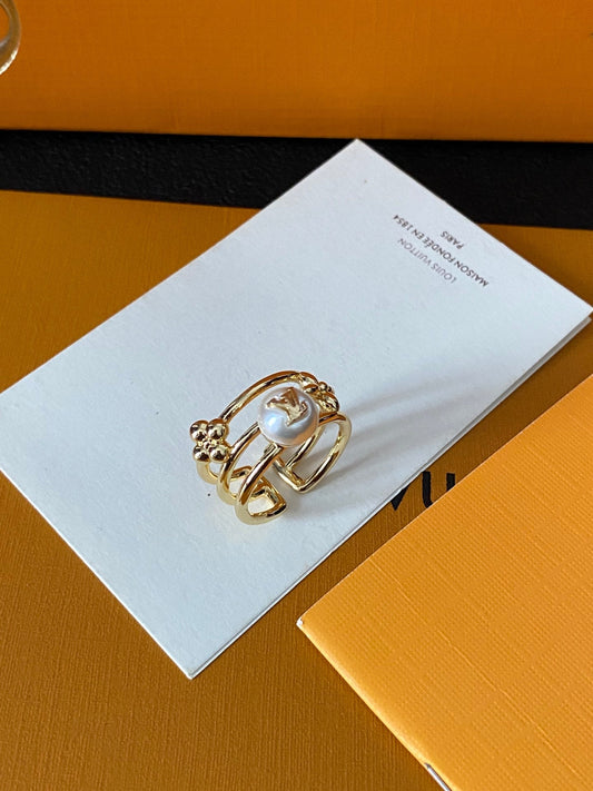 Bague luxueuse en laiton ornée d'une perle