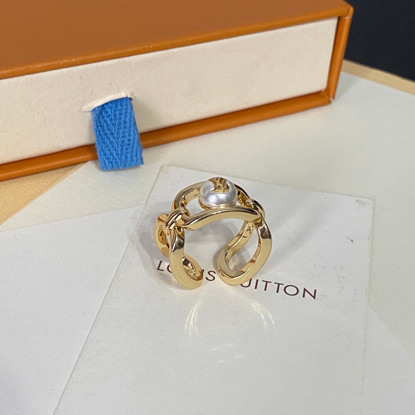 Anillo abierto con logotipo de perla redonda