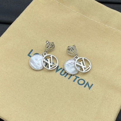 Boucles d'oreilles en métal avec pendentif rond siglé