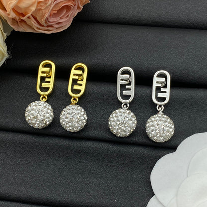 Pendientes metálicos con colgante de bola de cristal