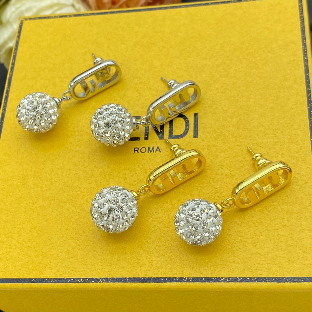 Pendientes metálicos con colgante de bola de cristal