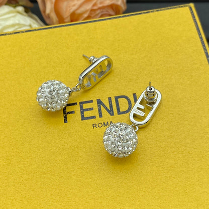 Pendientes metálicos con colgante de bola de cristal