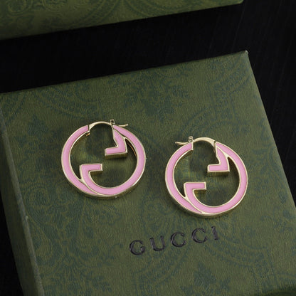 Boucles d'oreilles créoles rondes découpées en émail