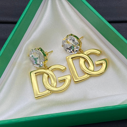 Boucles d'oreilles pendantes à logo doré