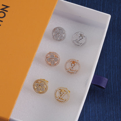 Pendientes de botón asimétricos con logotipo de diamantes de imitación