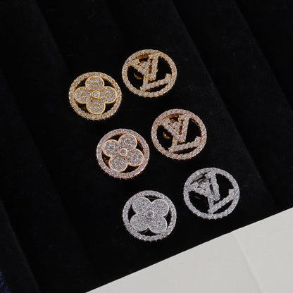 Pendientes de botón asimétricos con logotipo de diamantes de imitación