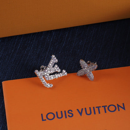 Boucles d'oreilles Logo Strass Violet