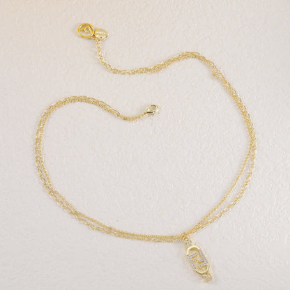 Collar con cristales de F entrelazadas