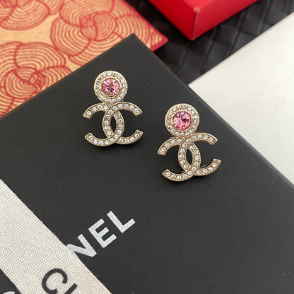 Boucles d'oreilles en strass roses