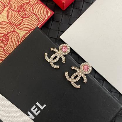Boucles d'oreilles en strass roses