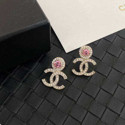 Boucles d'oreilles en strass roses